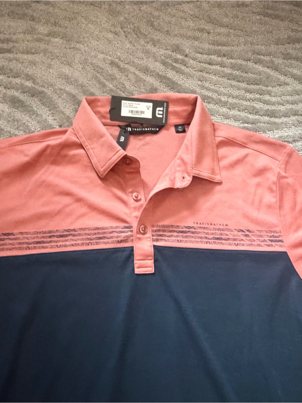 Travis Mathew Coral and Navy Short-Sleeve Polo